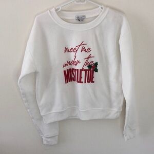 Meet me under the mistletoe crewneck.